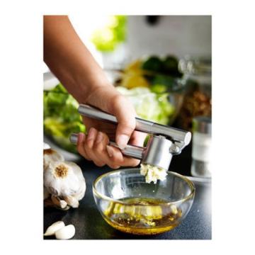 IKEA stainless steel garlic press removable insert sturdy kitchen tool KONCIS