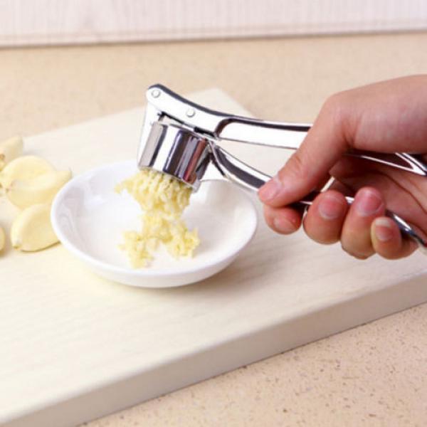 Stainless steel garlic presser /Mincer/Crusher/Chopper Ginger press With Ease #2 image